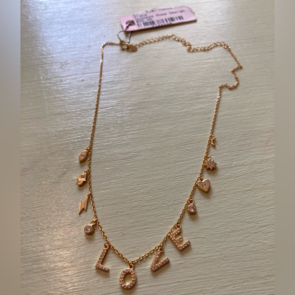 NWT Gold “LOVE” Charm Necklace